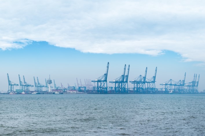 modern container seaport against a blue sky in tianjin